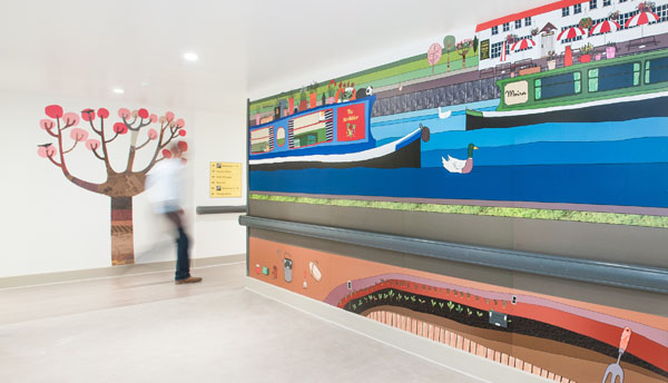 Familiar scenes actively support engagement in wall murals by Hannah Broadway. Photo by Clint Randall